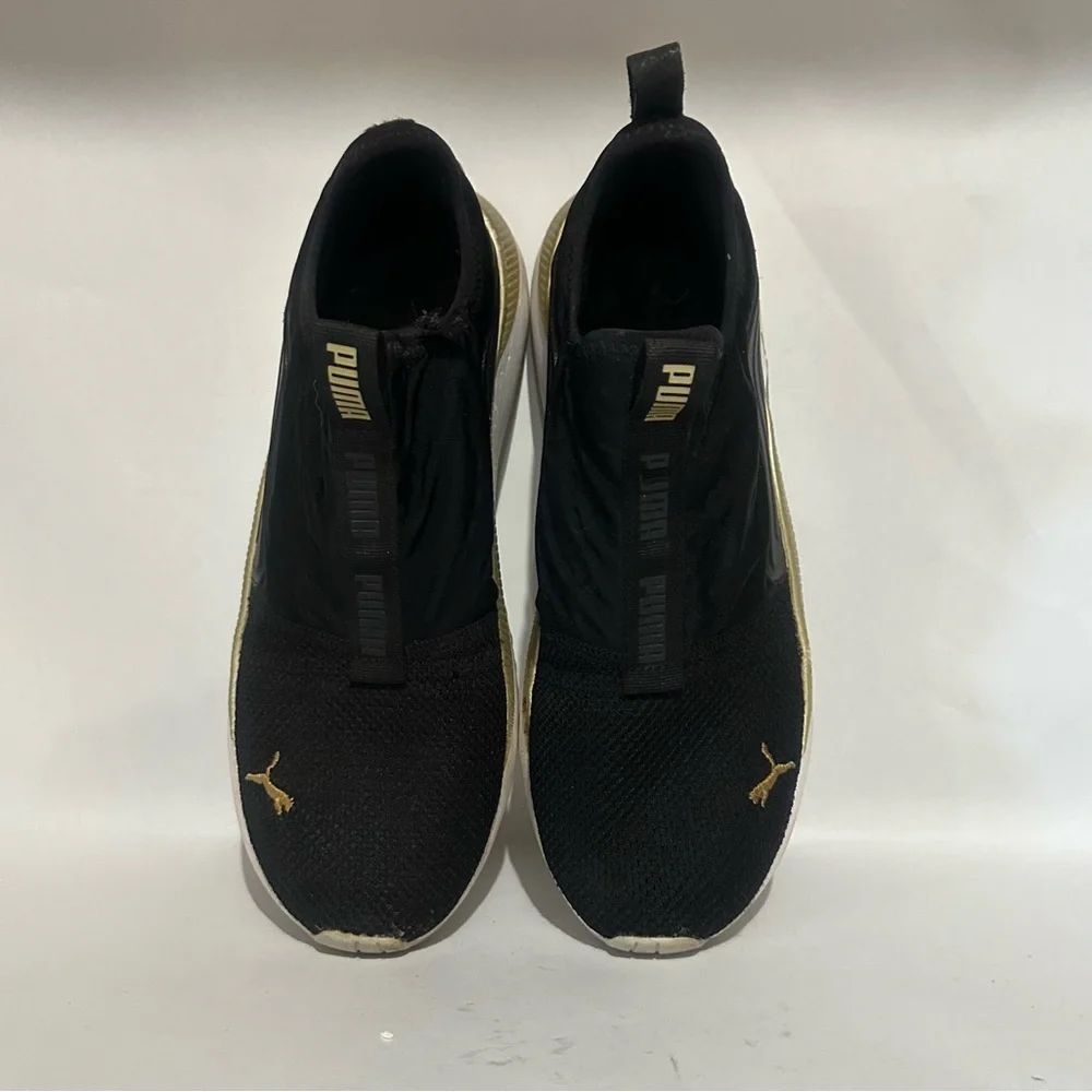 Puma Women’s Black and Gold Athletic Shoes